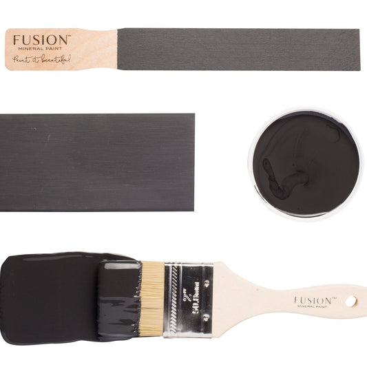 Fusion paint brush, black paint swatch, and can of Ash paint on a white background
