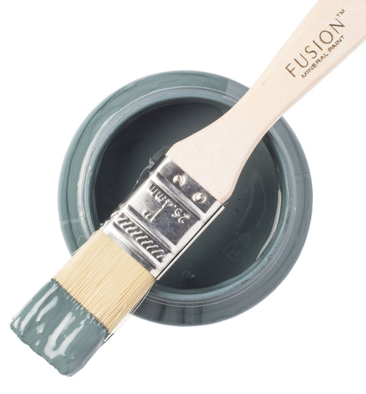 Fusion Mineral Paint in Blue Pine with a paintbrush