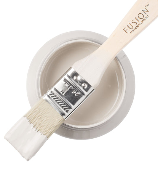 Fusion Mineral Paint with a paintbrush on a white background, labeled 'Cashmere'.