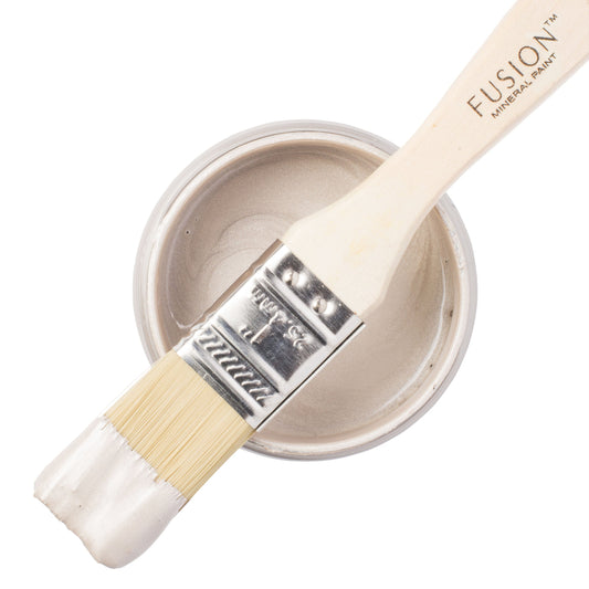 Fusion Mettalic Mineral Paint in Champagne with a paintbrush