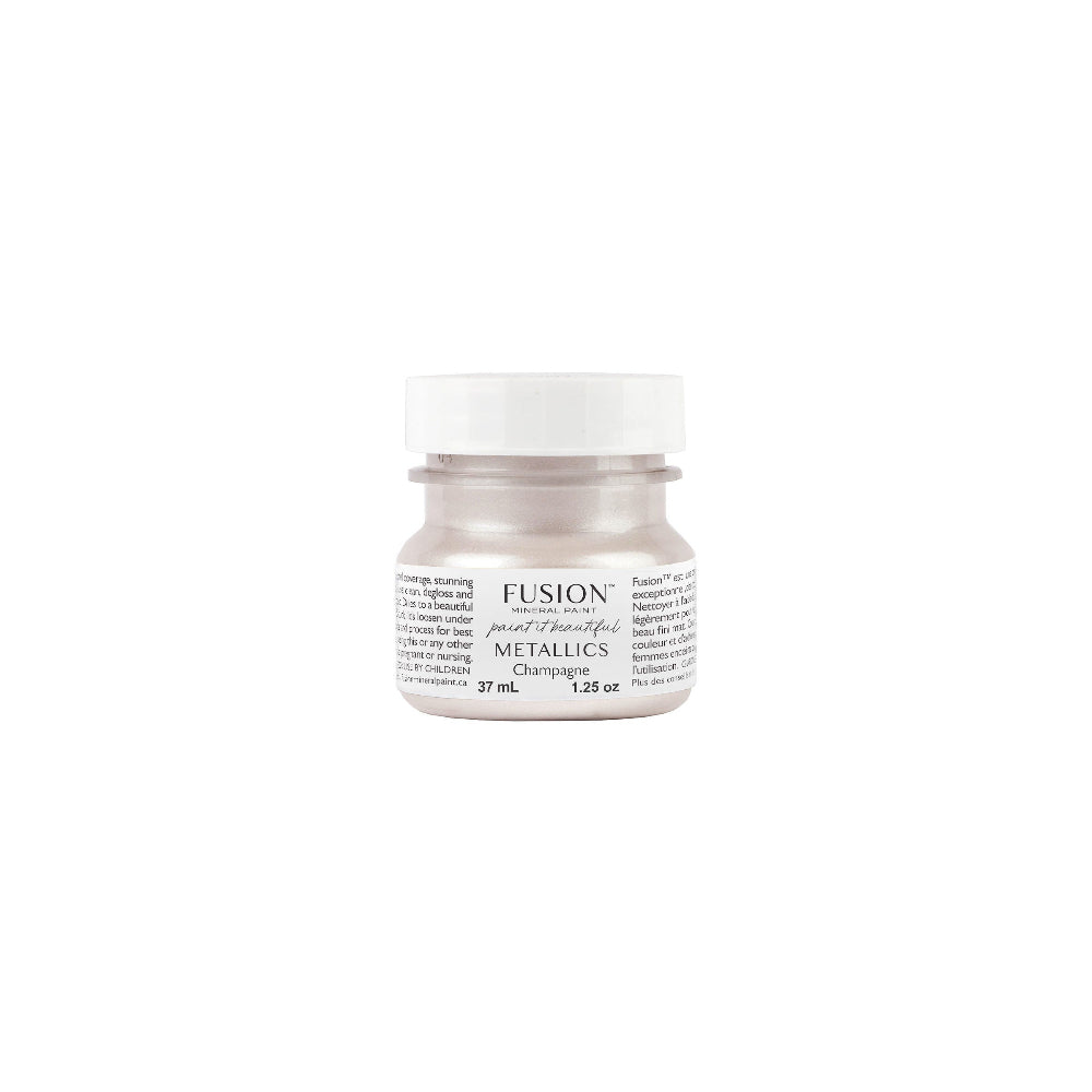 Tester size jar of Fusion Mineral Paint Metallics in Champagne on a white background