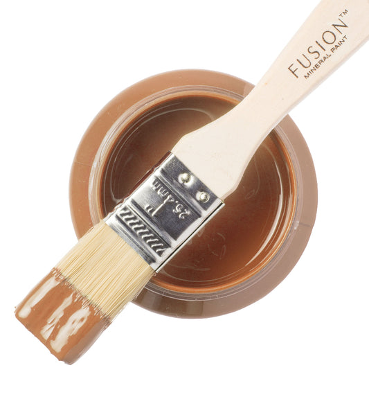 Fusion Mineral Paint in Chestnut Mare with a paintbrush on a white background