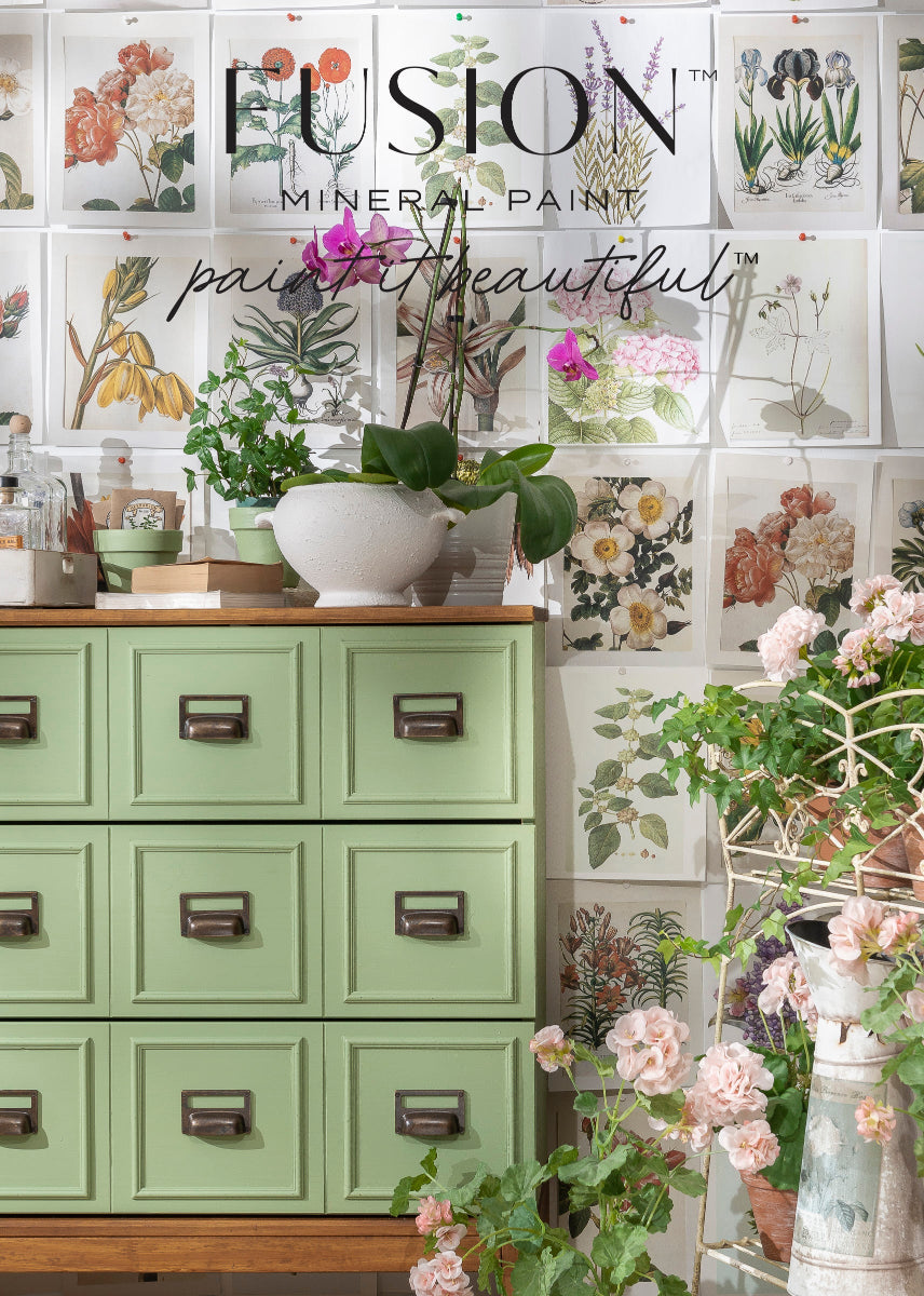 Display with cabinet painted in green Conservatory from Fusion Mineral Paint range and floral decorations