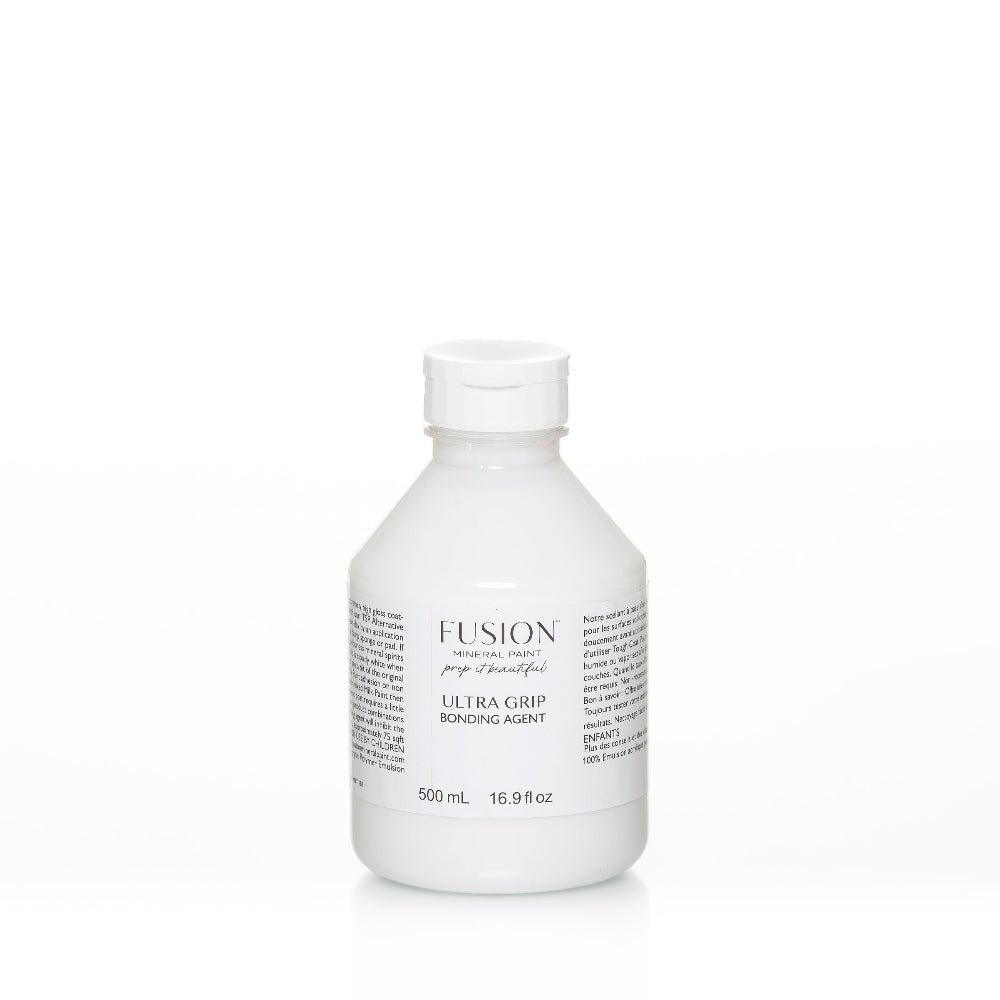White bottle of Fusion Ultra Grip Bonding Agent on a white background