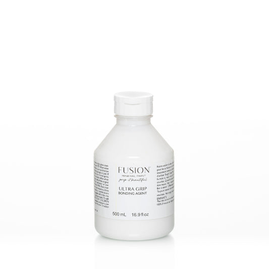 White bottle of Fusion Ultra Grip Bonding Agent on a white background