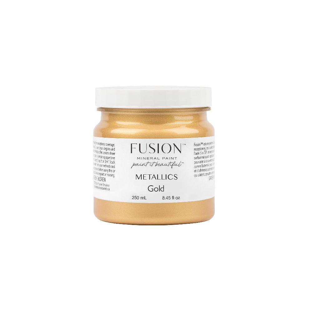 Jar of Fusion Metallics Gold paint on a white background