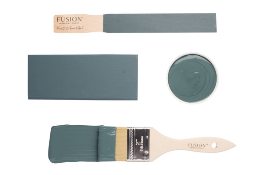 Fusion Homestead Blue paint swatch, brush, and container on a white background