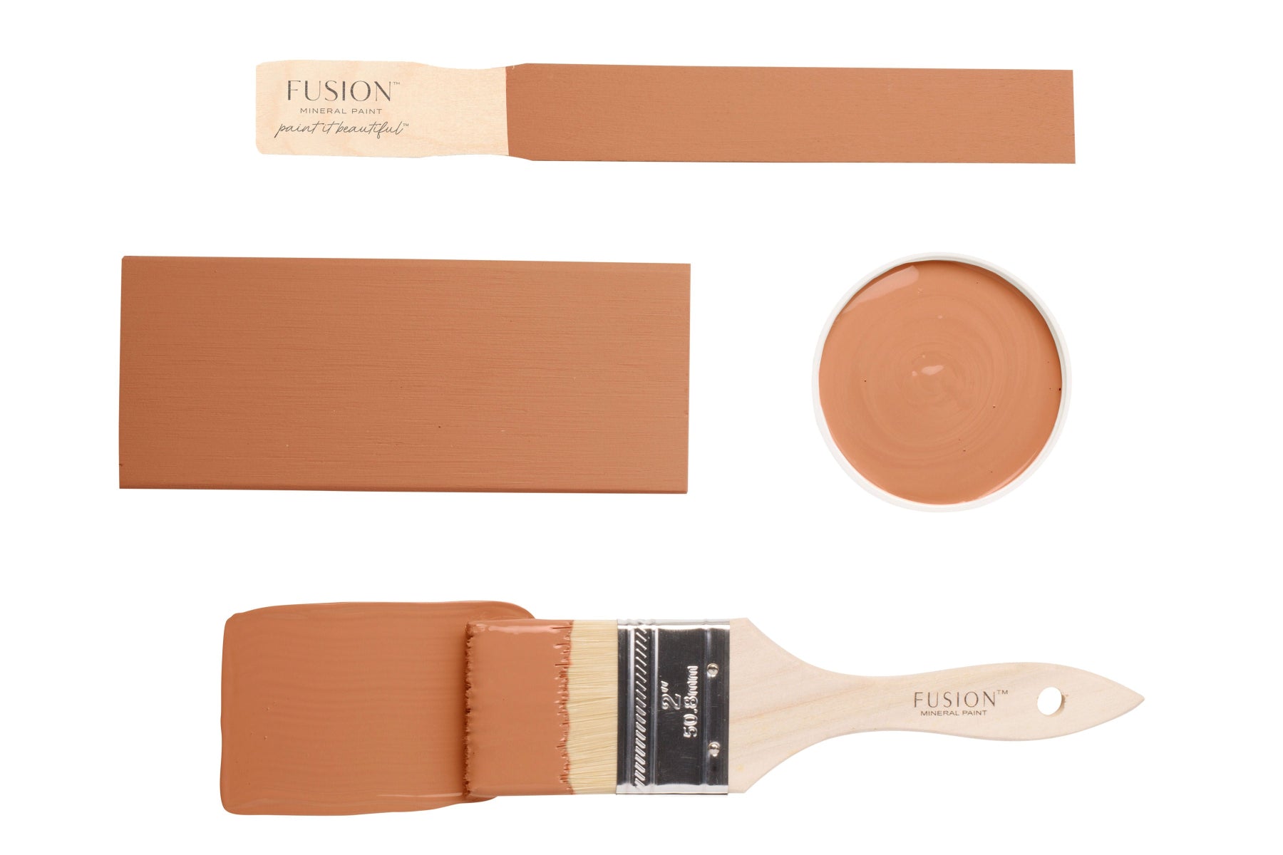 Iron Clay Fusion Mineral Paint on a brush and samples against a white background