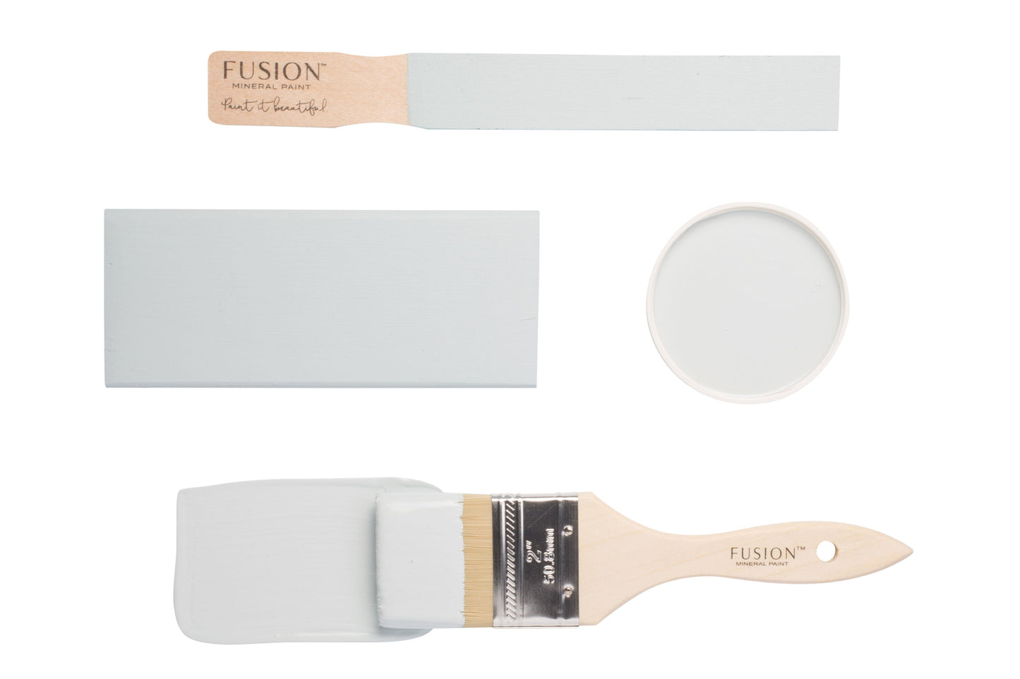 Fusion paintbrushes and paint swatches with Little Whale colour on a white background