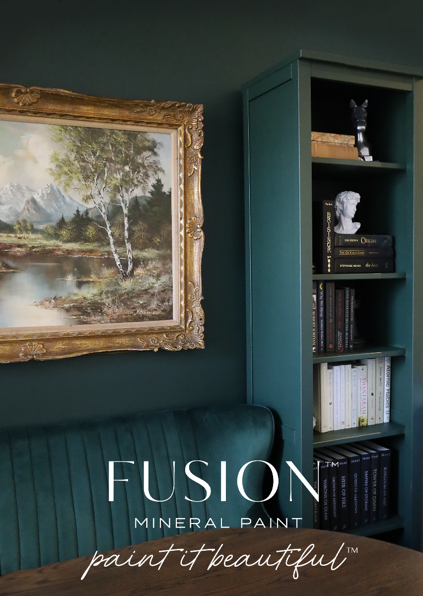 Room interior with a bookshelf painted in Manor Green from Fusion Mineral Paint range