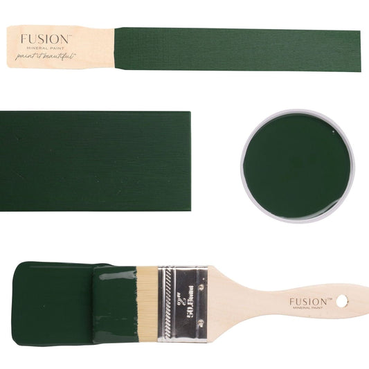 Fusion paintbrushes and paint swatches with Manor Green colour on a white background
