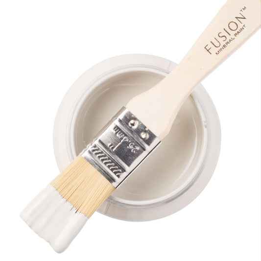 Pebble Fusion Mineral Paint with a brush