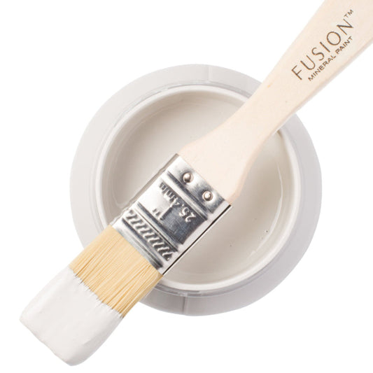 Sterling Fusion Mineral Paint with a paintbrush