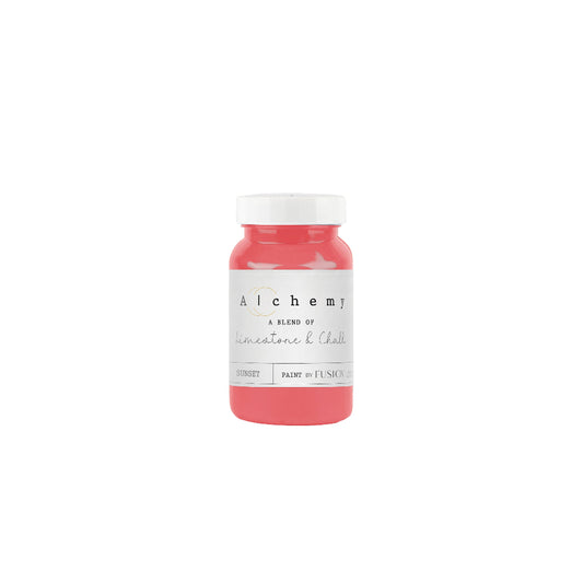 Jar of bright coral-coloured Sunset from Alchemy by Fusion on a white background