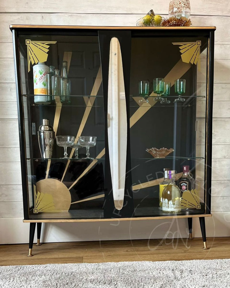 Gold Art Deco glass transfers on the doors of a black upcycled cocktail cabinet, refinished by Upcycled & Reloved by Jodi in Surrey, UK.