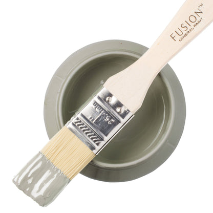Fusion Mineral Paint brush with a sample of 'Bellwood' colour on a white background