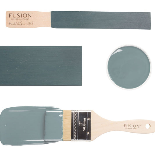 Fusion paint swatch with brush and colour name 'Blue Pine' on a white background
