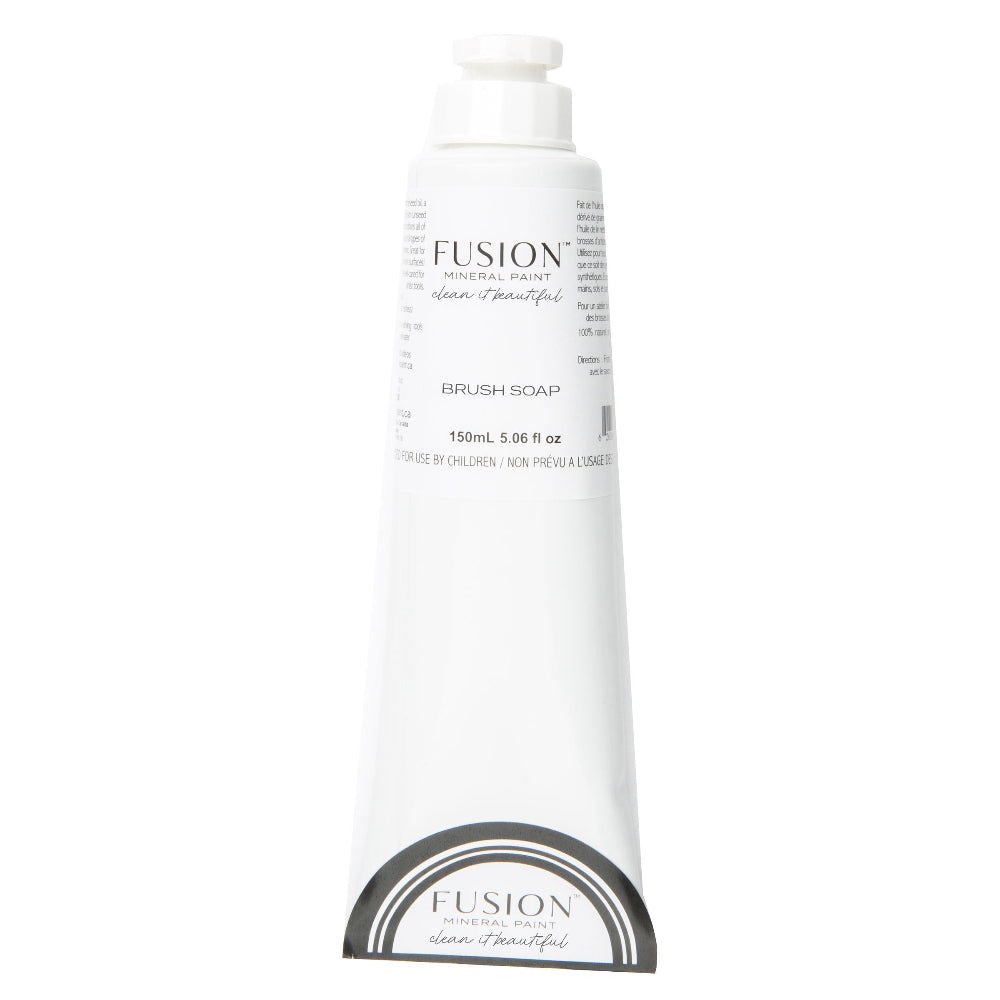 Tube of Fusion Brush Soap on a white background