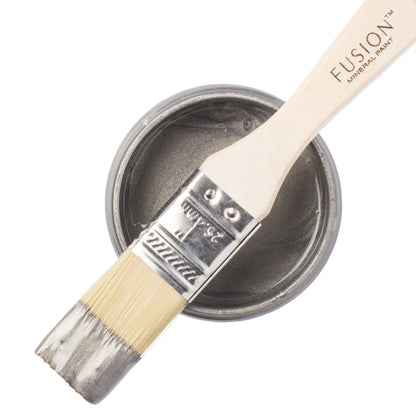 Fusion Mineral Paint in Brushed Steel Metallic with a paintbrush