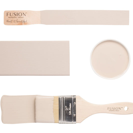 Fusion paintbrushes and colour swatch labelled 'Cathedral Taupe' on a white background