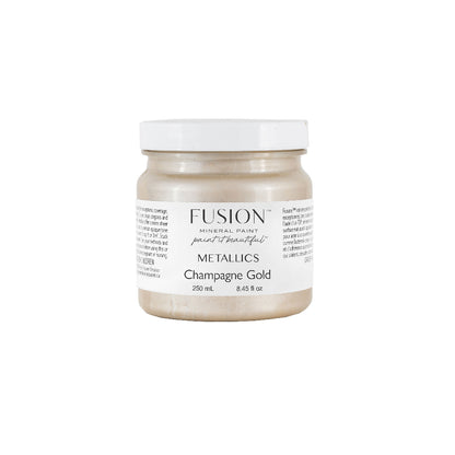 Fusion Metallics Champagne Gold paint jar on a white background