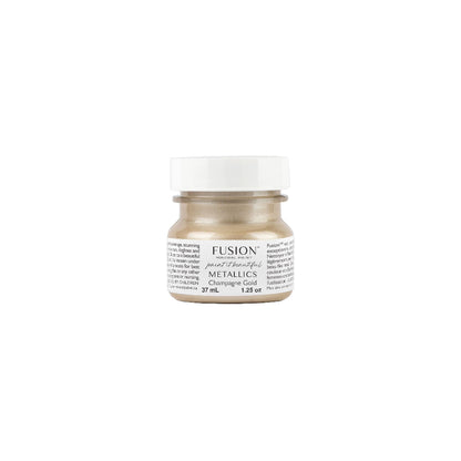 Tester size jar of Fusion Mineral Paint in Champagne Gold on a white background