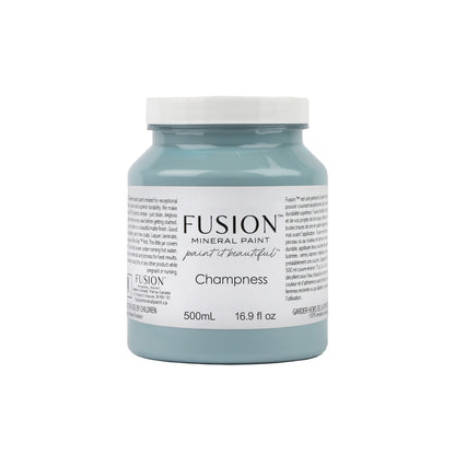 Fusion Mineral Paint jar labelled 'Champness' on a white background