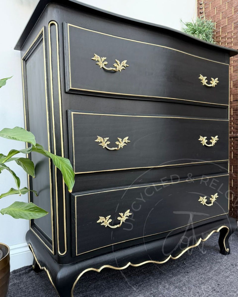 Black and gold upcycled chest of drawers painted in Fusion Mineral Paint Coal Black by Upcycled & Reloved by Jodi.