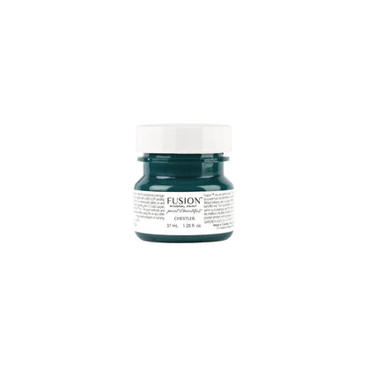A tester-sized jar of Fusion Mineral Paint in dark blue green Chestler on a white background.