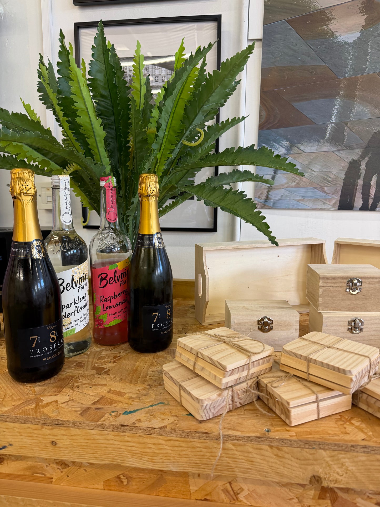Creative Paint and Prosecco evening. A ln image of wooden craft items ready to be Painted at leatherhead workshop. An intro to cycling with painting home decor during a creative workshop while sipping prosecco, relaxing and socialising
