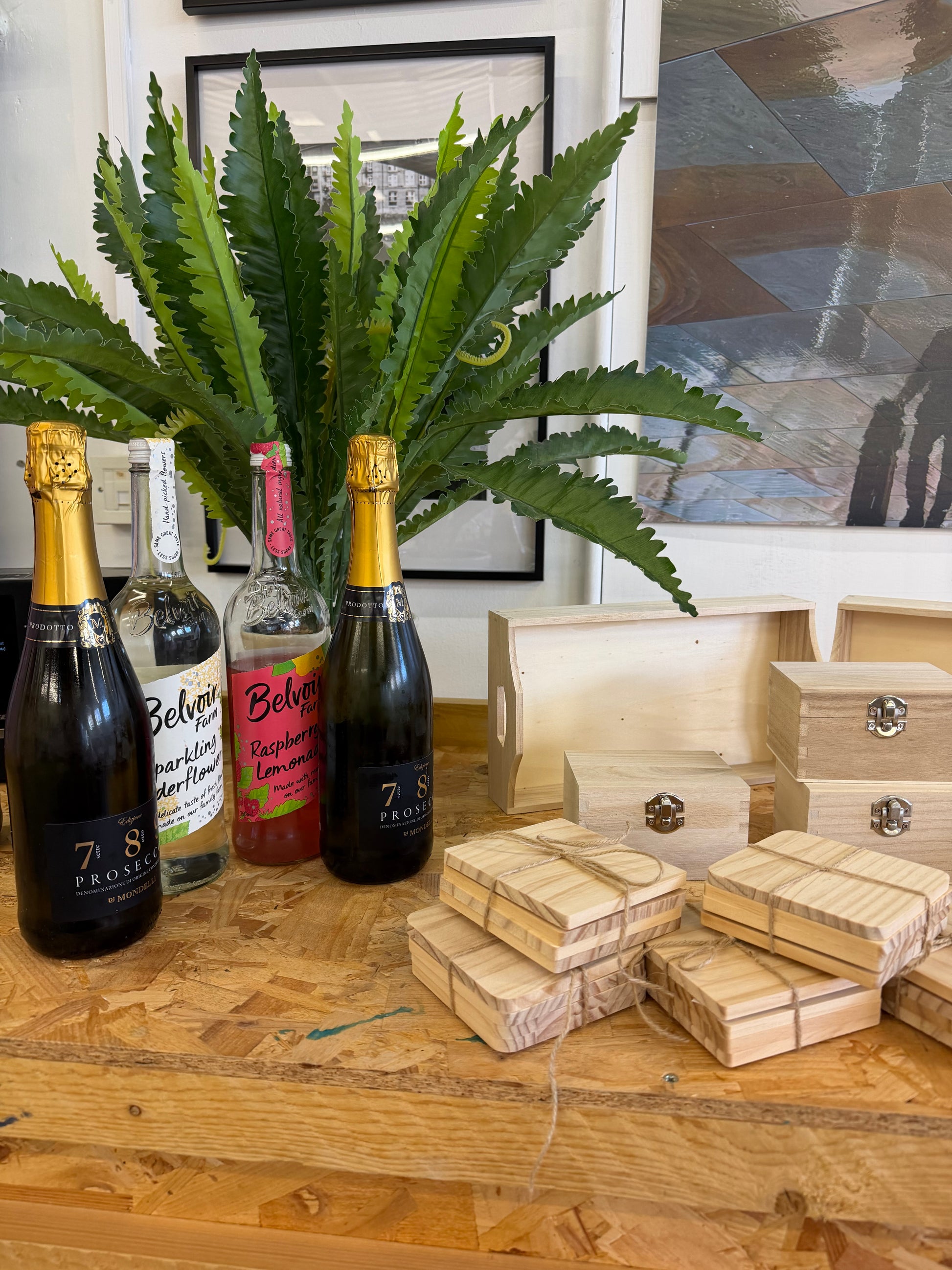 Creative Paint and Prosecco evening. A ln image of wooden craft items ready to be Painted at leatherhead workshop. An intro to cycling with painting home decor during a creative workshop while sipping prosecco, relaxing and socialising