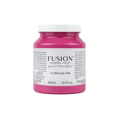 Jar of Fusion Mineral Paint in bright  Cureiously Pink colour on a white background.