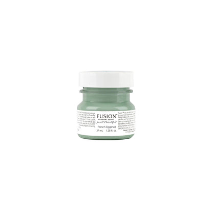 French Eggshell tester-sized paint jar with white lid on a white background