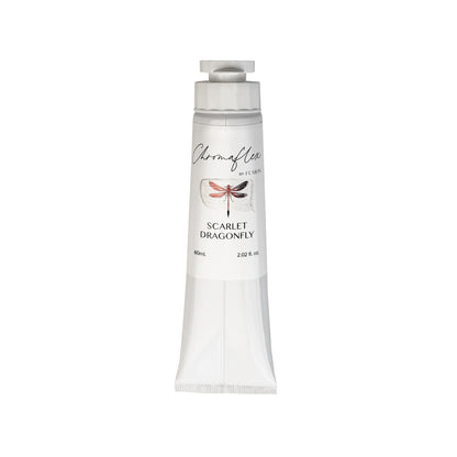A white tube of Scarlet Dragonfly ChromaFlex Fusion Mineral Paint with a red dragonfly design on a white background