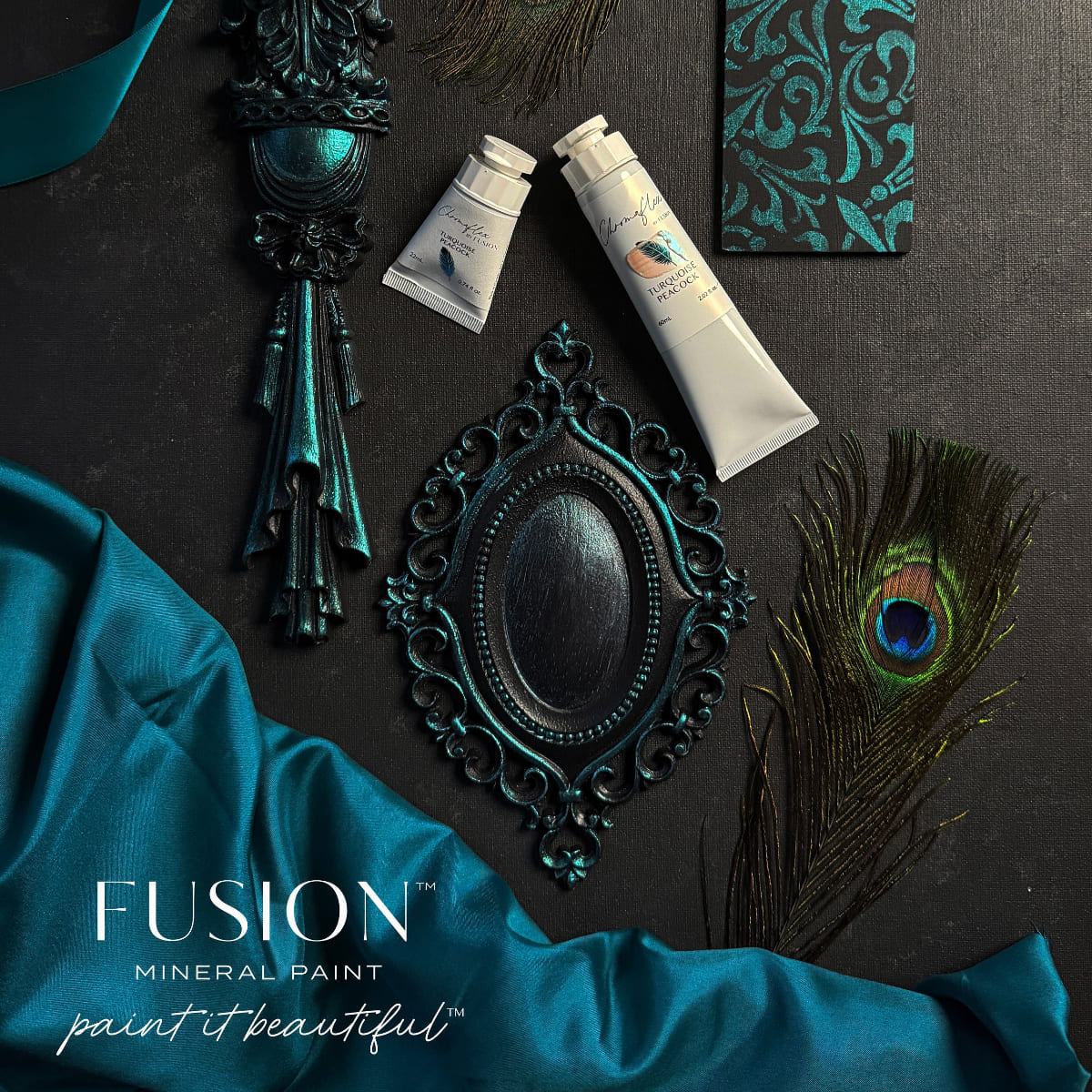 An assortment of a peacock feather and metal objects in shimmering Turquoise Peacock ChromaFlex paint from Fusion Mineral Paint