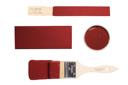 Fusion paintbrushes and paint swatches with red Highlander colour on a white background