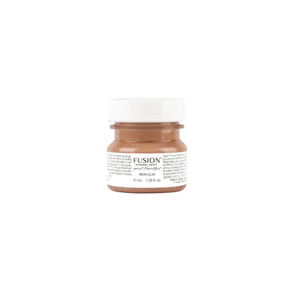 Tester size jar of Fusion Mineral Paint in Iron Clay on a white background