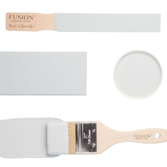 Fusion paintbrushes and paint swatches with Little Whale colour on a white background