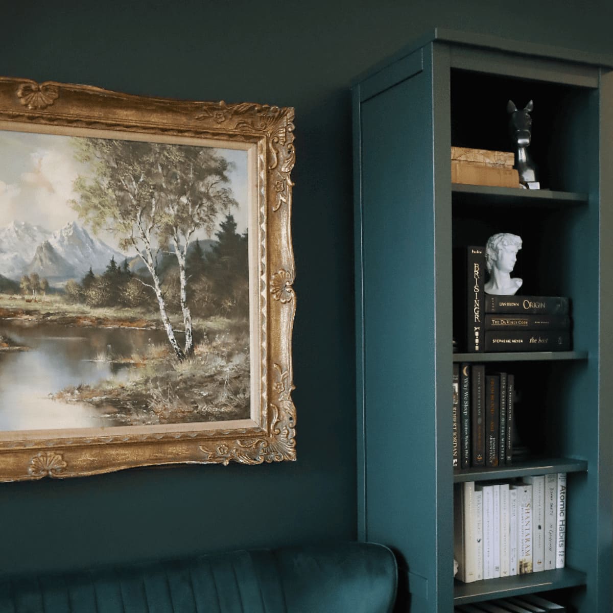 Room interior with a bookshelf painted in Manor Green from Fusion Mineral Paint range