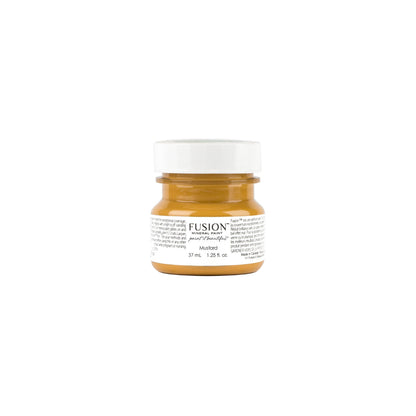 Tester size jar of Fusion Mineral Paint in Mustard colour on a white background