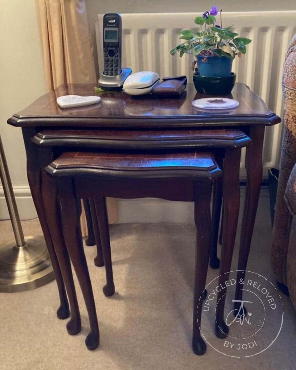 A set of 3 nesting tables in their original wood with 'Upcycled & Reloved by Jodi' branding 