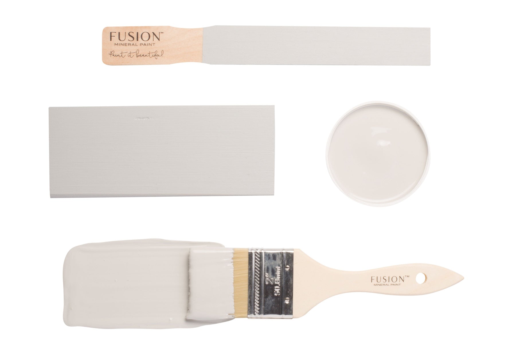 Paint brushes and colour swatches of Pebble from Fusion Mineral Paint range on a white background