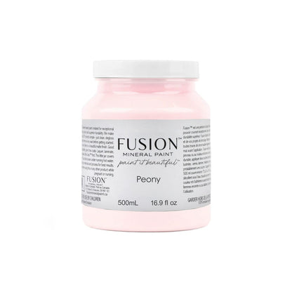 Jar of Fusion Mineral Paint in soft blush pink Peony colour on a white background Pale pink fusion mineral paint for upcycling furniture easy to use paint in peony pink Fusion paint stockist Surrey