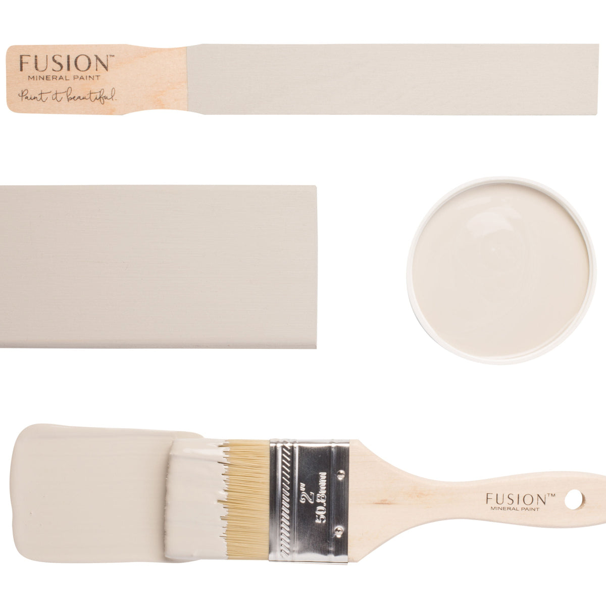 Fusion paintbrushes with Putty furniture paint sample on a brush and a sample stick. Creamy beige furniture paint sample on a white background