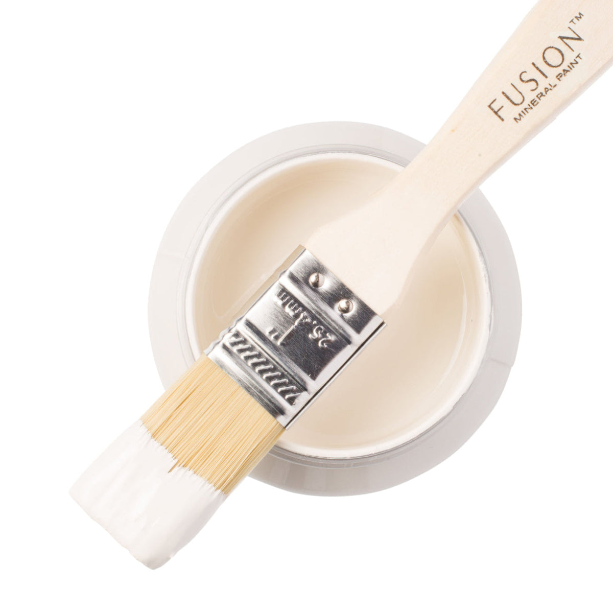 Fusion Mineral Paint in Raw Silk with a paintbrush