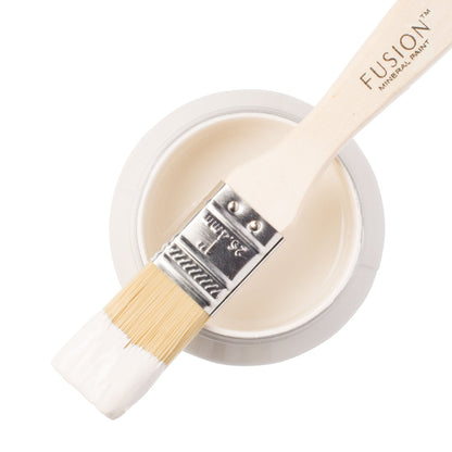 Fusion Mineral Paint in Raw Silk with a paintbrush