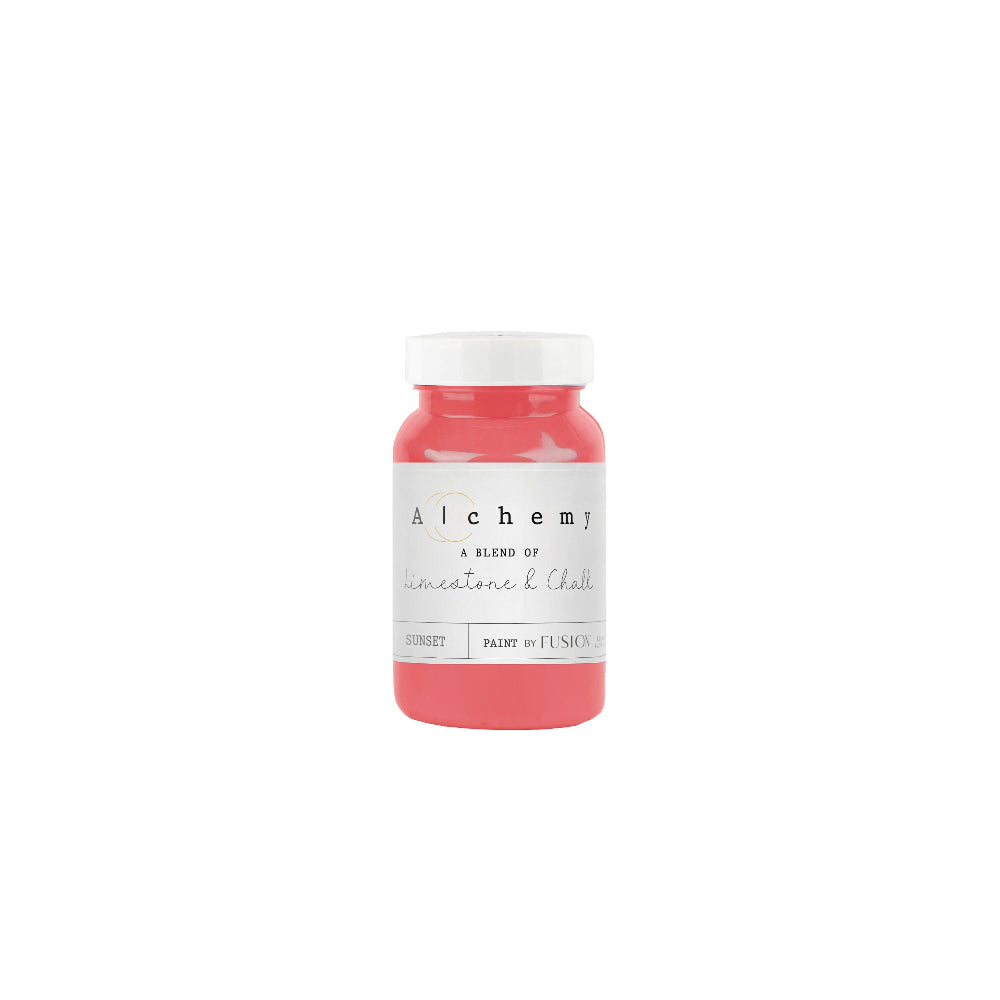 Jar of bright coral-coloured Sunset from Alchemy by Fusion on a white background