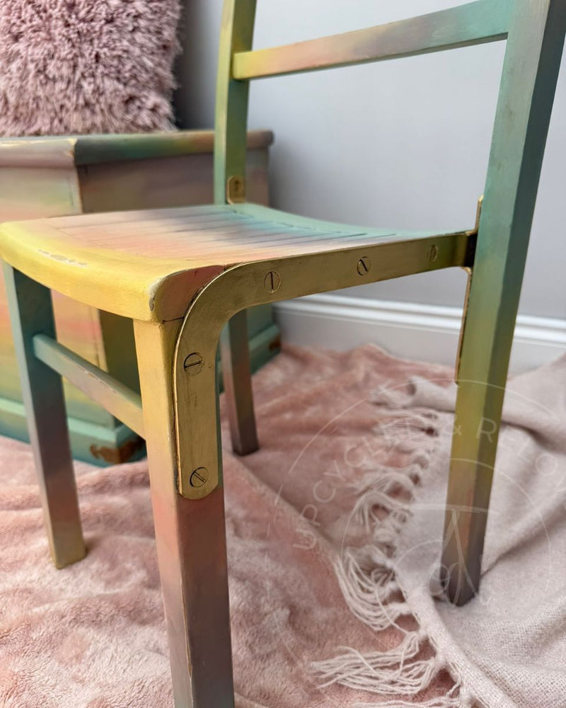 Pastel ombre painted chair with soft pink, yellow, green and blue tones from the Fusion Mineral Paint range.