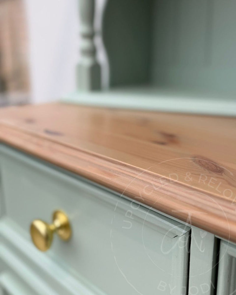 Close up of washed wood top on a Welsh dresser upcycled by Upcycled & Reloved by Jodi in soft blue-green Fusion Mineral Paint Inglenook.