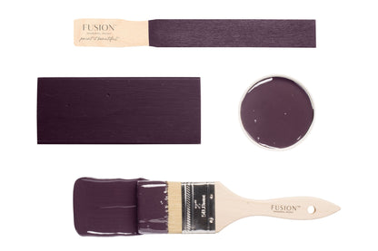 Fusion paint brush with Velvet Plum colour swatch on a white background